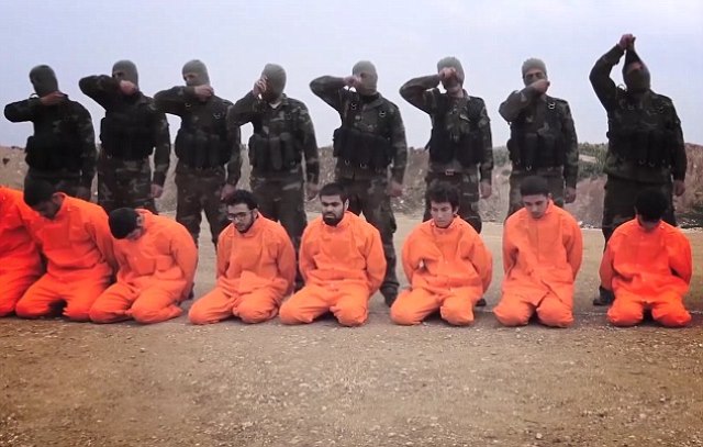 Сирийские повстанцы показали боевикам ИГИЛ, как надо правильно казнить - ВИДЕО